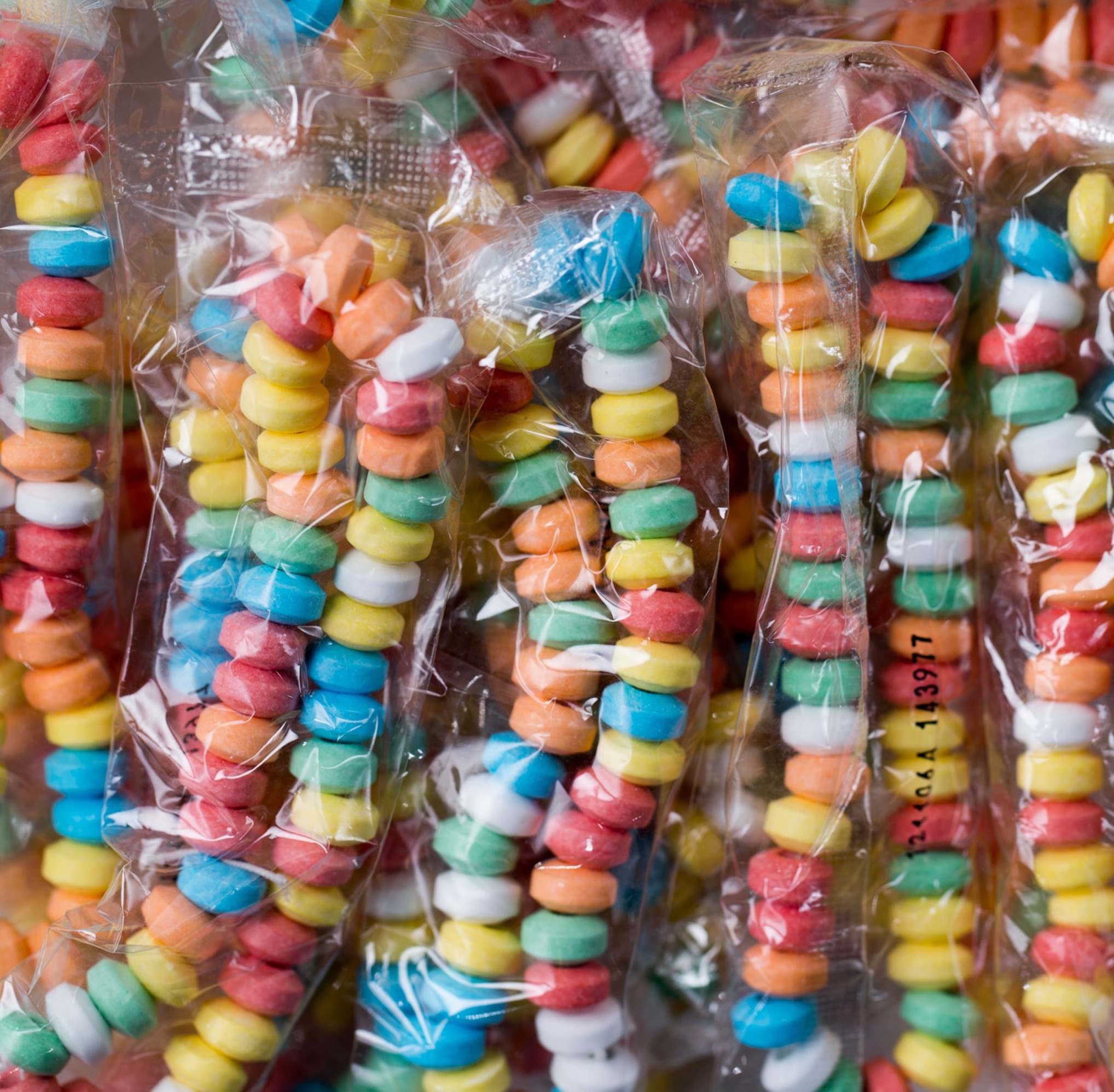 Item# C109395 - Bulk Unwrapped Candy Necklace (100pcs @ $0.20pc)